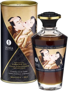 Immagine dell'olio afrodisiaco riscaldante Intimate Kisses - Latte d'Amour di Shunga
