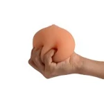 Image of the Mini Ball Boob Masturbator by Shequ, a fun and sexy accessory