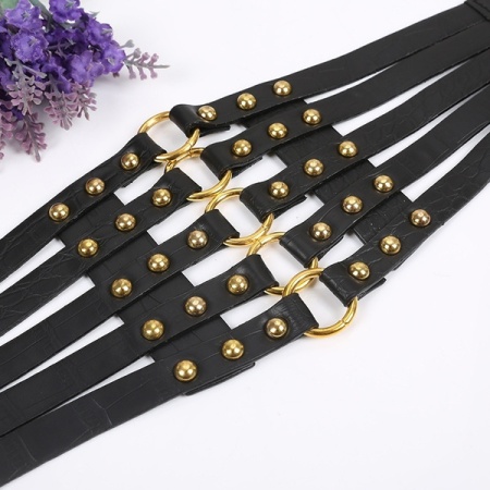 Image of the waist belt in black imitation leather with gold detailing