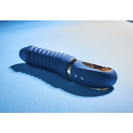 Abbildung des Nereos Vibrators von Dream Toys aus dunkelblauem Silikon mit goldenen Details