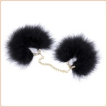 Image of feather cuffs with gold chain, a sexy and original accessory