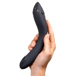 Image of the Womanizer OG G-Spot Stimulator, a black sextoy designed to stimulate the G-spot