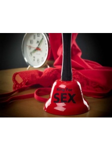 Red metallic bell with 'Ring for Sex' print, produced by Ozzé