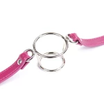 BDSM Bondage Knebel mit doppelten Ringen aus rosa Kunstleder