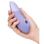 Image du stimulateur clitoridien ENHANCE par Womanizer, couleur violet