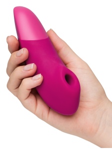 Stimolatore clitorideo ENHANCE di Womanizer in silicone rosa