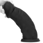 Immagine di un dildo realistico XXL con base di aspirazione in silicone nero