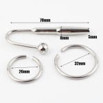 Image showing the Ultimate Bondage Head Ring with Urethral Sounds in stainless steel