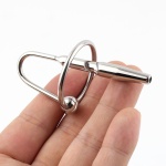 Image showing the Ultimate Bondage Head Ring with Urethral Sounds in stainless steel