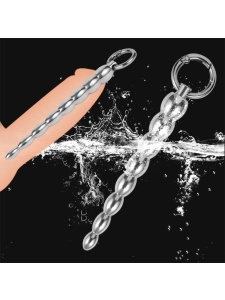Immagine di un dilatatore uretrale in metallo a coste con anello, un prodotto per la salute e il piacere